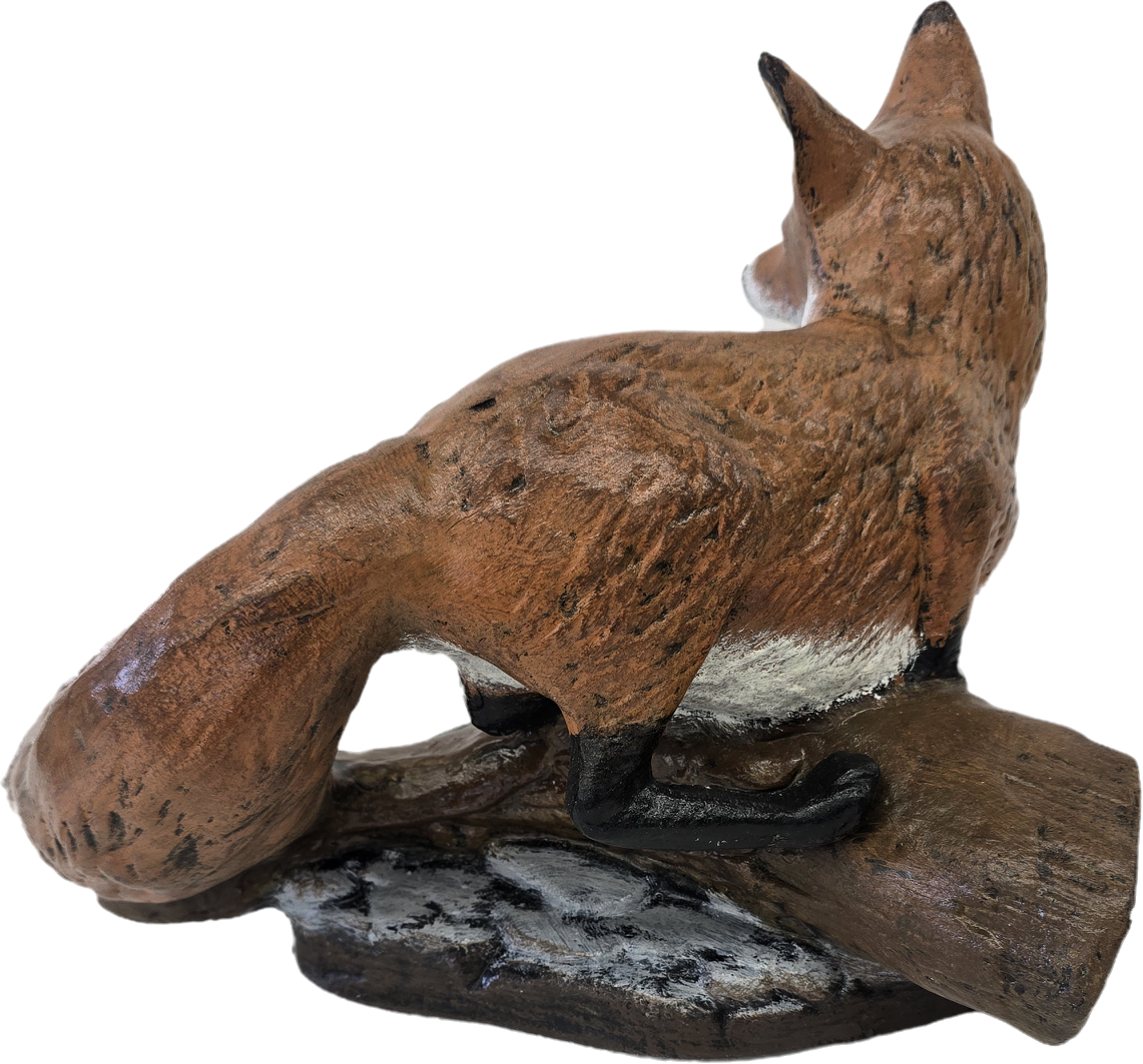 Fox Sitting on Log