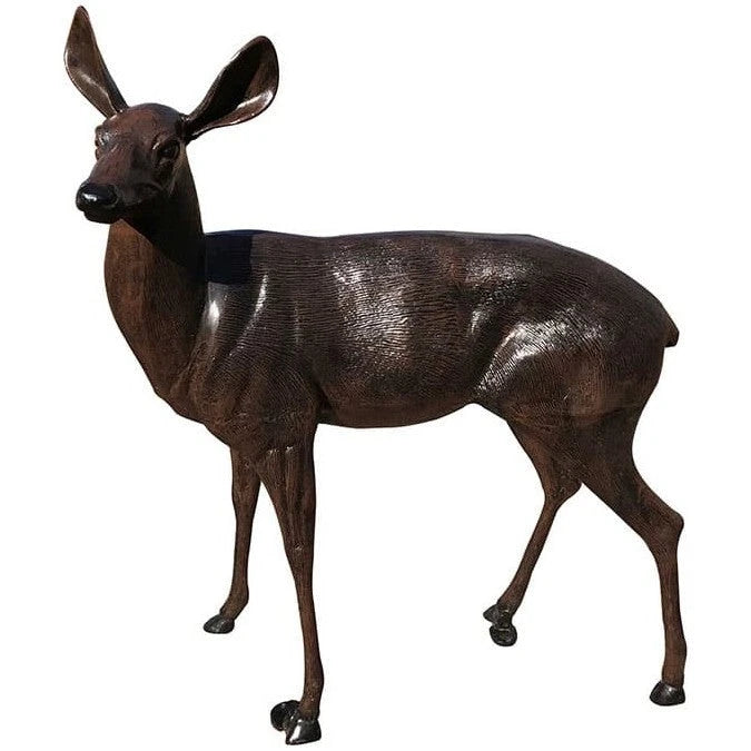 Cast aluminum deer doe with textured body in natural stance for outdoor displays.