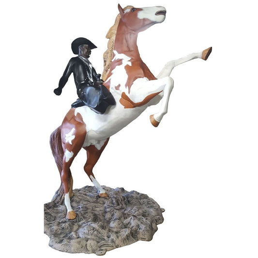 Cast aluminum cowboy on rearing horse statue for yard or home decor