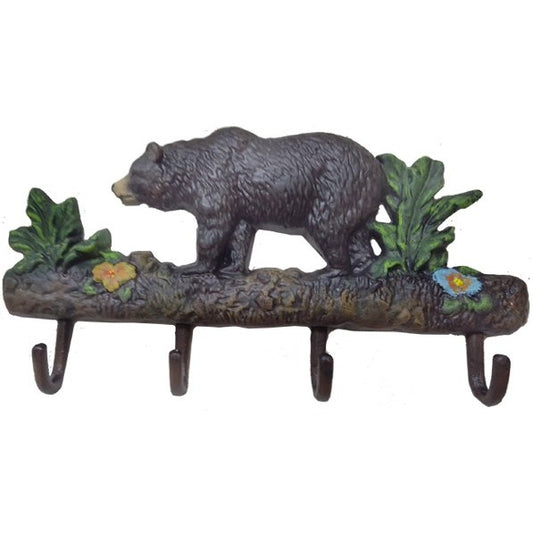 Cast aluminum bear wall hook with floral accents, rustic outdoor decor for home or yard