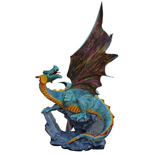 Cast aluminum dragon statue with blue scales, red wings, perched on rock for garden decor