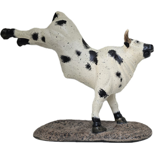 Cast aluminum cow statue with black spots, playful pose for yard or home decor
