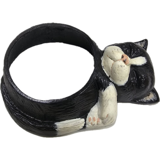 Black and white cat statue with curled tail, perfect for garden or home decor