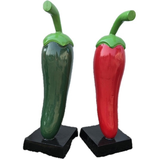 Cast aluminum green and red pepper statues for garden or home decor, vibrant outdoor accents