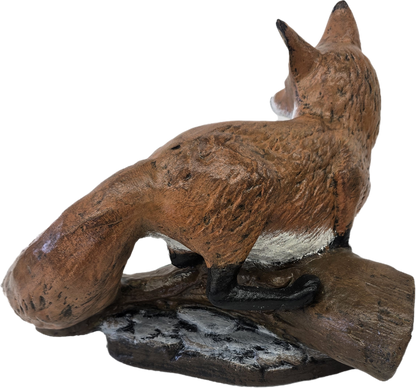 Fox Sitting on Log