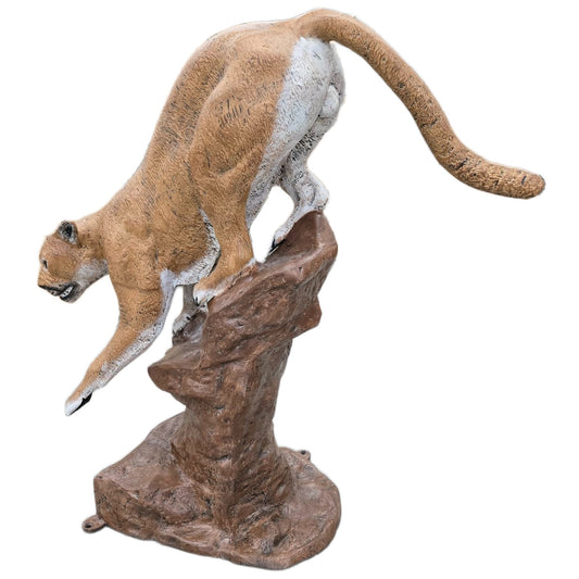 Cast aluminum cougar statue perched on rock, outdoor yard decor with lifelike detail