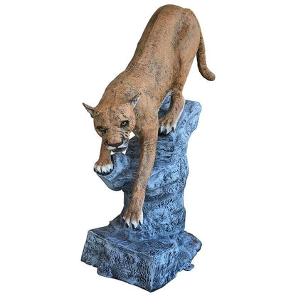 Cast aluminum cougar statue poised on rocky base, perfect for yard or home decor