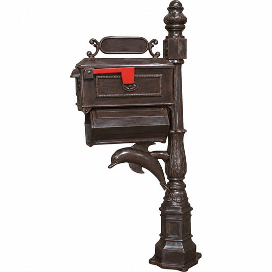 Intricate cast aluminum mailbox and paper holder featuring a dolphin