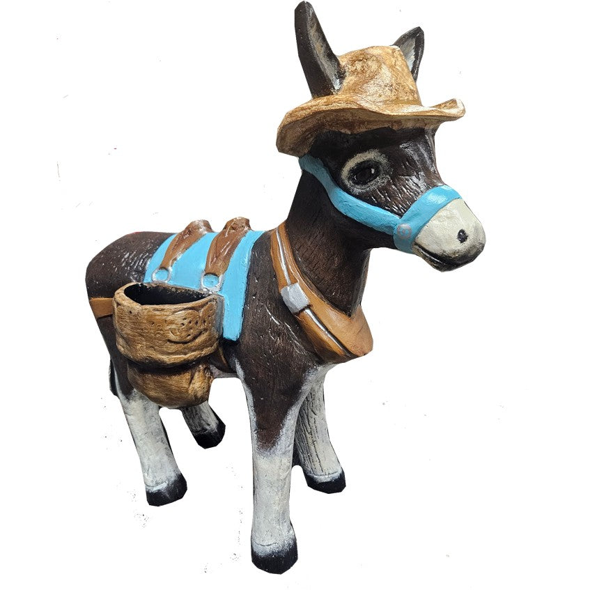 Cast aluminum donkey statue with cowboy hat, blue harness, and saddlebags for yard or home decor