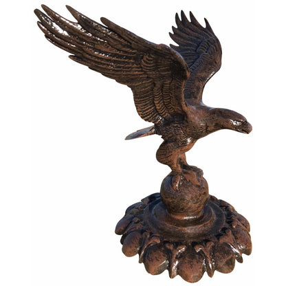 Cast aluminum eagle statue with outstretched wings, perched on globe base for yard or home decor