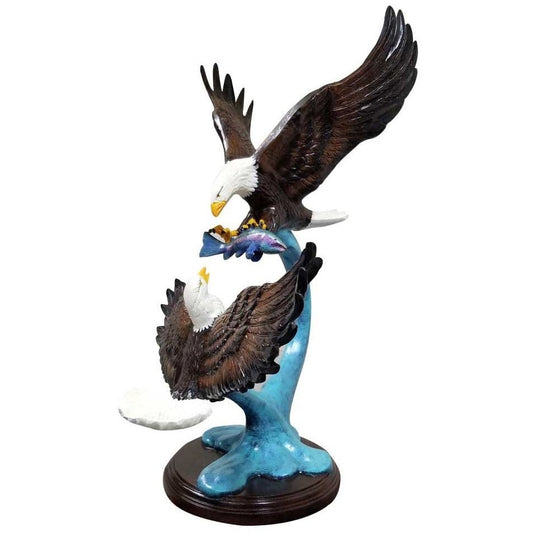 Cast aluminum eagle statue with outstretched wings, clutching fish, for yard or home decor