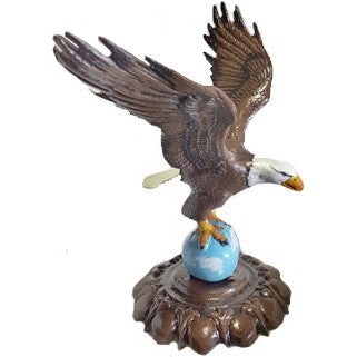 Cast aluminum eagle statue with outstretched wings perched on globe, ideal for yard or home decor