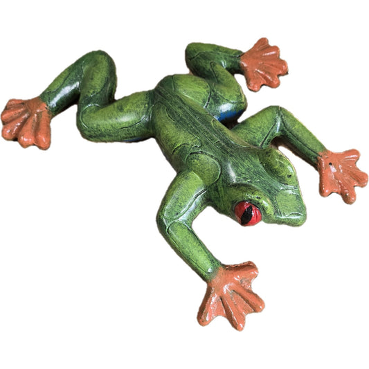 Green tree frog statue with red eyes and orange feet, cast aluminum garden decor for backyard