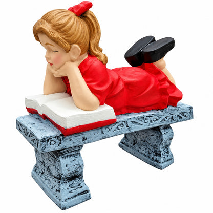 Cast aluminum girl reading on a bench for outdoor gardens