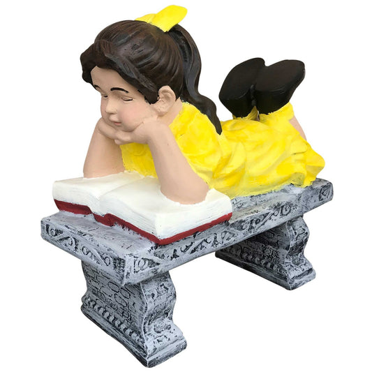 Girl in yellow dress reading book on bench, cast aluminum garden statue for yard decor