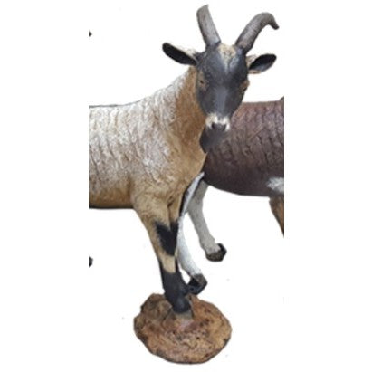 Cast aluminum goat statue with curved horns, standing on rocky base for yard or home decor