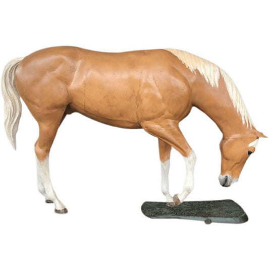 Cast aluminum horse statue with palomino coat, white mane and tail, grazing pose for yard decor