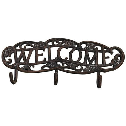 Cast aluminum welcome wall hook with ornate scroll design and three hooks for home or yard decor