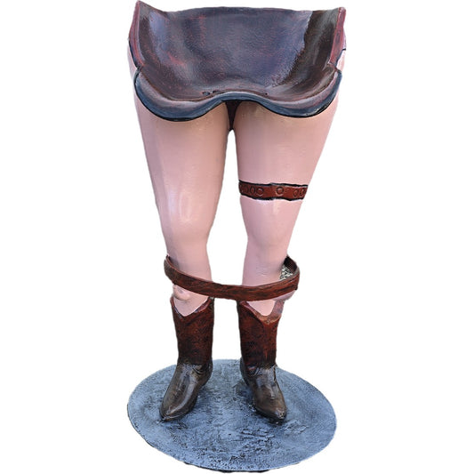 Cast aluminum cowboy statue with boots and saddle, outdoor yard decor