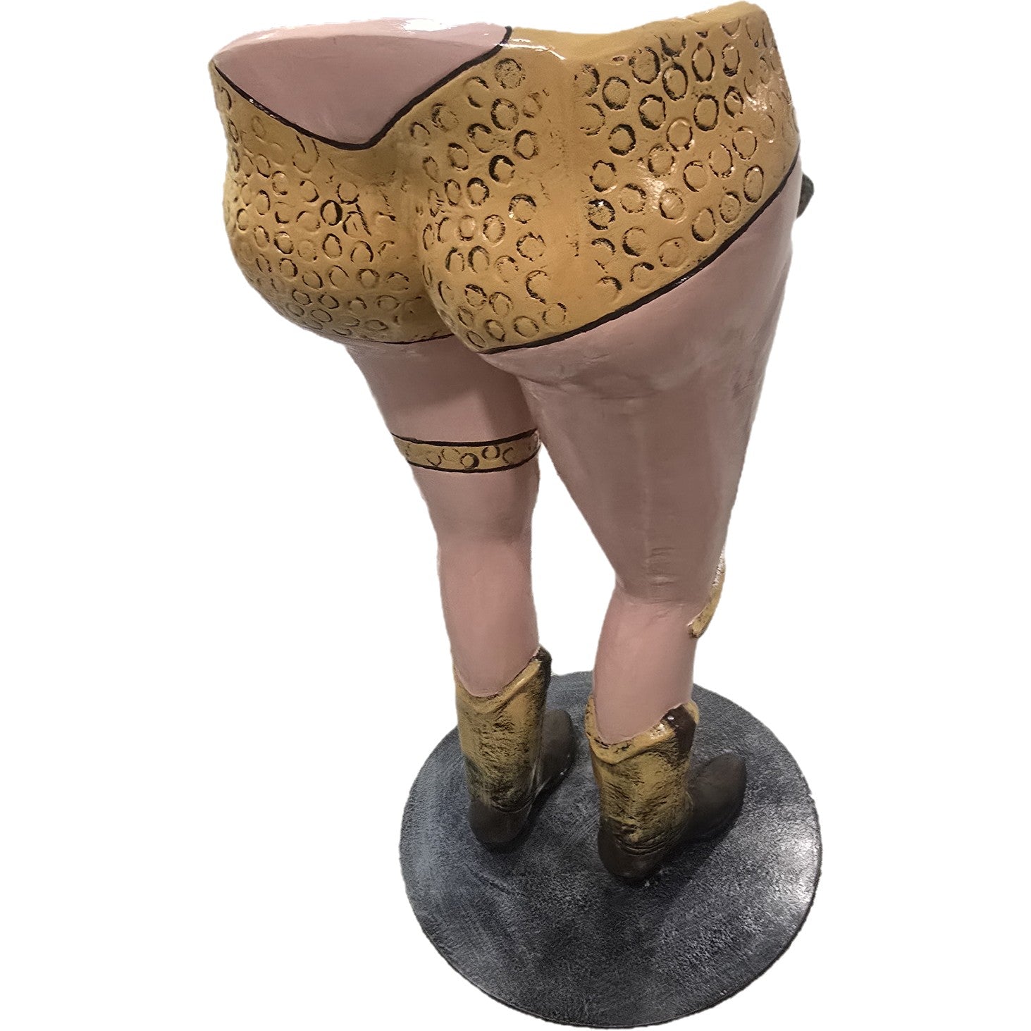 Cast aluminum cowboy boots statue with gold patterned shorts, backyard decor