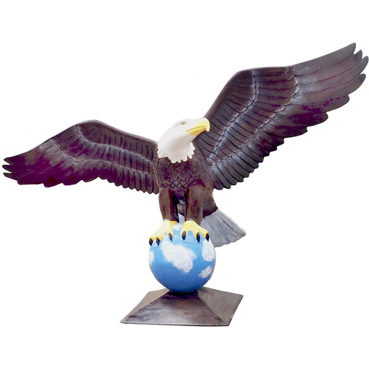 Cast aluminum bald eagle statue with wings spread, perched on globe for yard or home decor