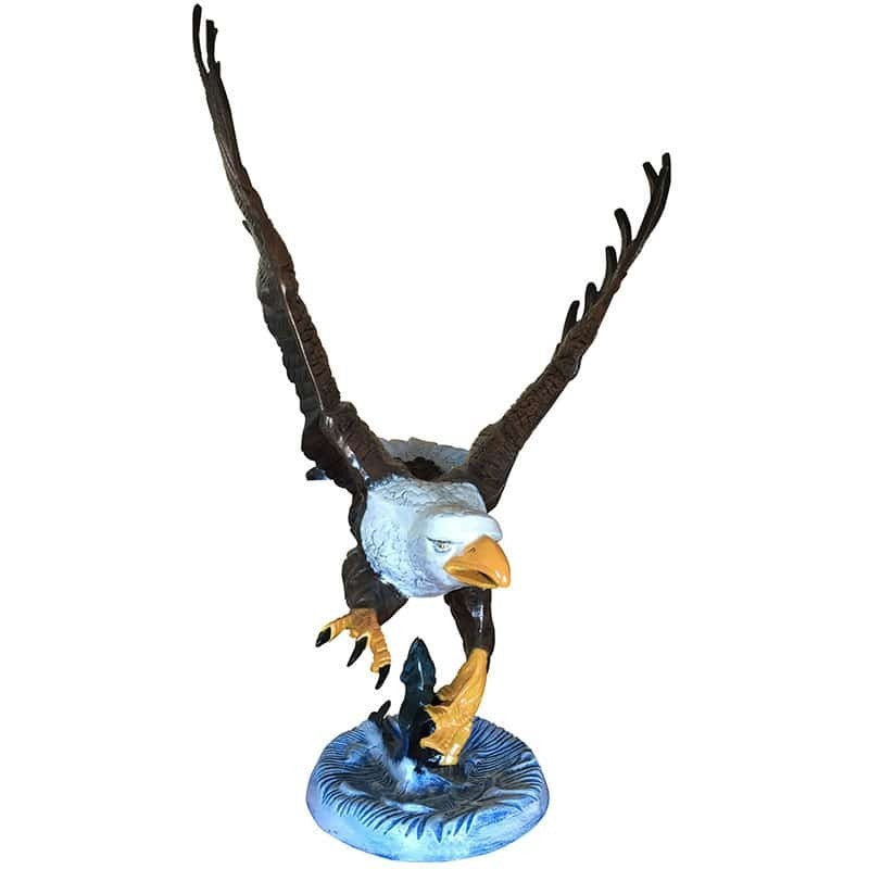 Cast aluminum bald eagle statue with outstretched wings, perched on blue base, for yard or home decor