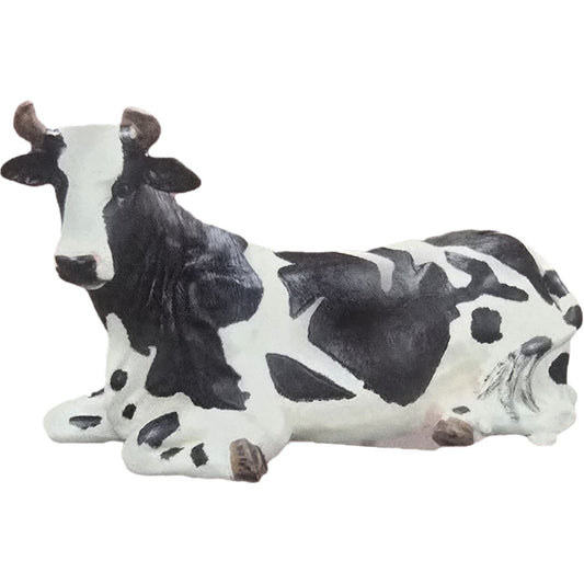 Black and white cow statue lying down, cast aluminum garden decor for backyard or yard