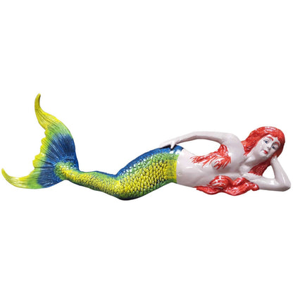 Colorful mermaid statue with red hair and blue-green tail, perfect for garden or yard decor