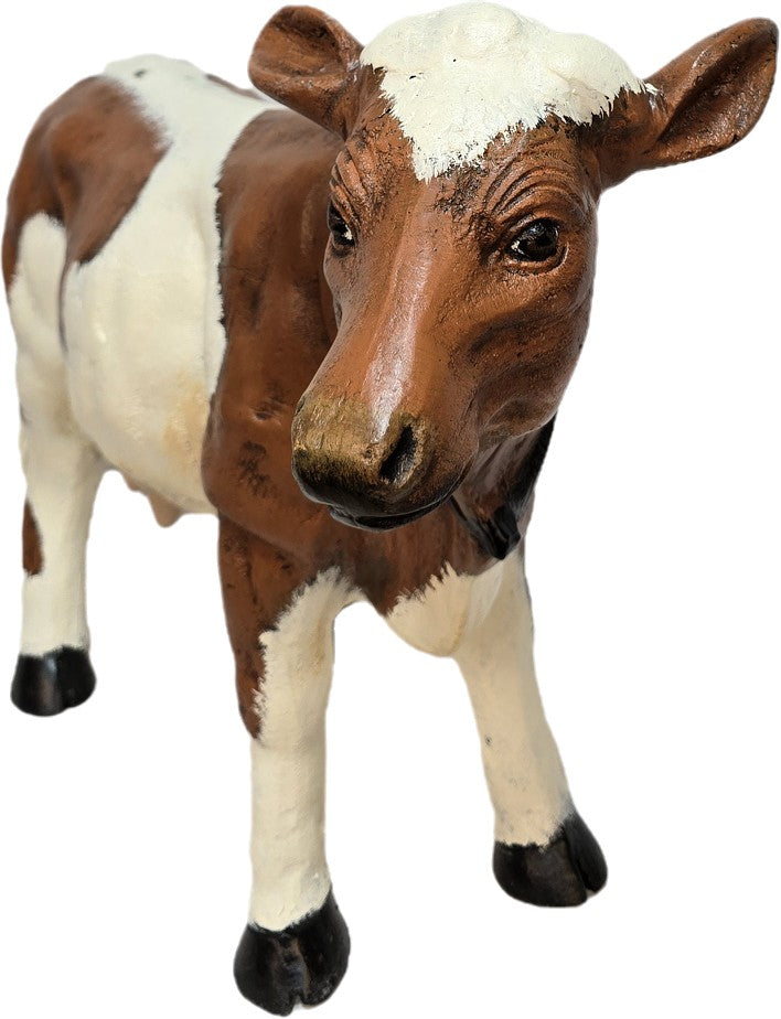 Brown and white cast aluminum cow statue for yard or home decor