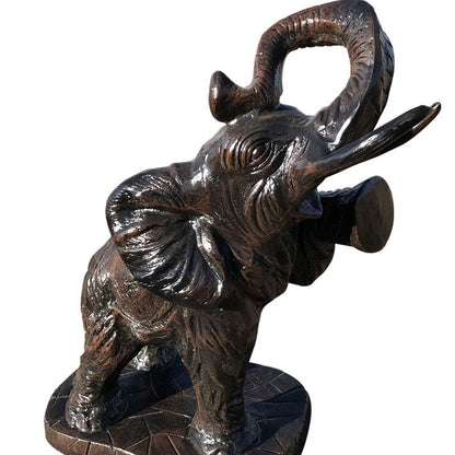 Cast aluminum elephant statue with raised trunk, perfect for yard or home decor