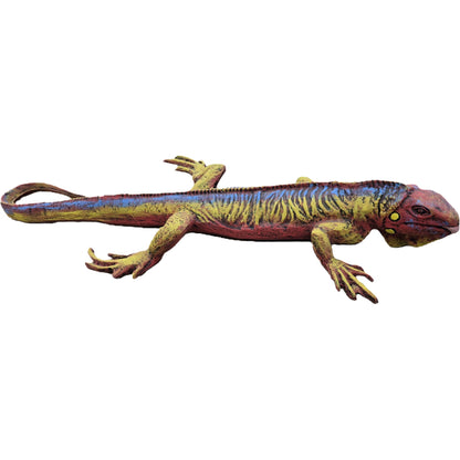 Colorful cast aluminum iguana statue for garden or yard decor, featuring vibrant red, yellow, and blue hues.