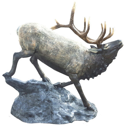 Cast aluminum elk statue with detailed antlers, standing on rocky base for yard or home decor