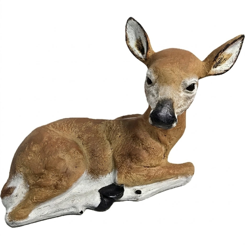 Cast aluminum laying down fawn for indoor or outdoor display spaces.