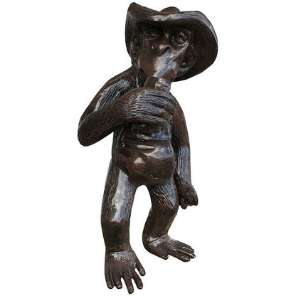 Cast aluminum monkey statue wearing cowboy hat, rustic outdoor decor for yard or garden