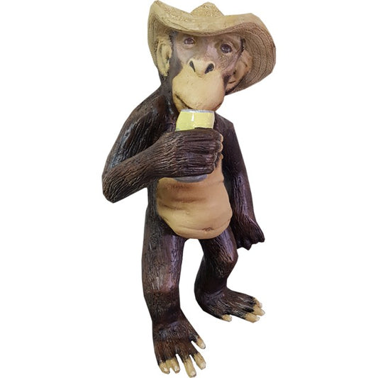 Cast aluminum monkey statue wearing cowboy hat, holding drink, for yard or home decor