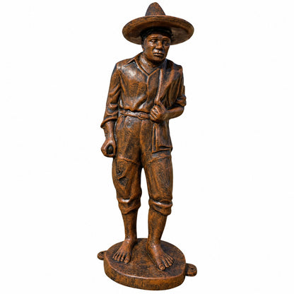 Cast aluminum Pedro in bronze colors wearing hat and holding scarf over his shoulder for residential or commercial design spaces.