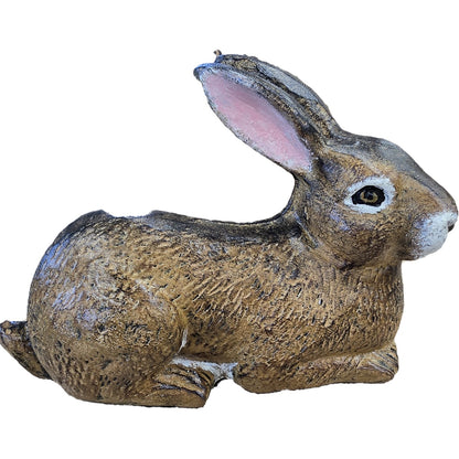 Cast aluminum rabbit statue with textured fur and pink inner ears for garden or home decor