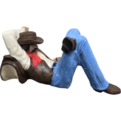 Relaxing cowboy statue in hat and red bandana, cast aluminum yard decor