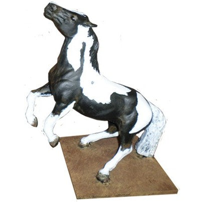 Black and white cast aluminum horse statue rearing on base, outdoor yard decor
