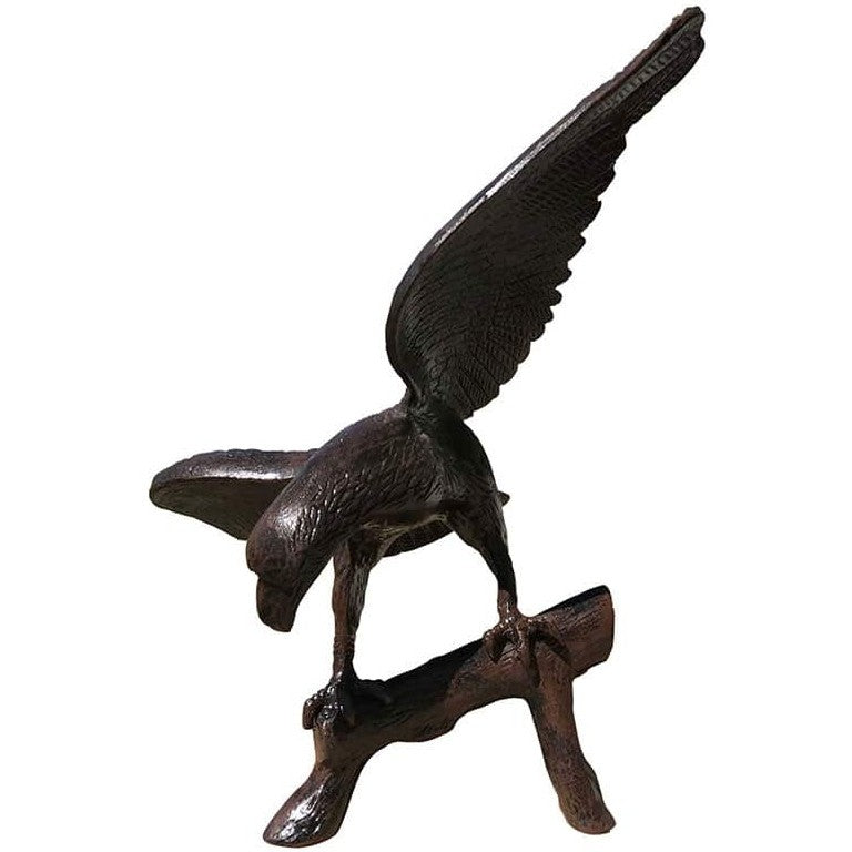 Cast aluminum eagle statue with outstretched wings perched on branch, outdoor yard decor