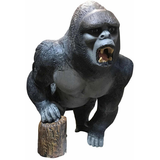 Cast aluminum gorilla statue roaring with detailed fur, posed on tree stump for yard or home decor