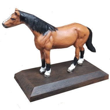 Cast aluminum horse statue with black mane and tail, standing on wooden base for yard or home decor