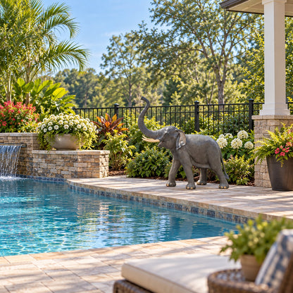 Cast aluminum elephant statue with raised trunk, ideal for yard or home decor