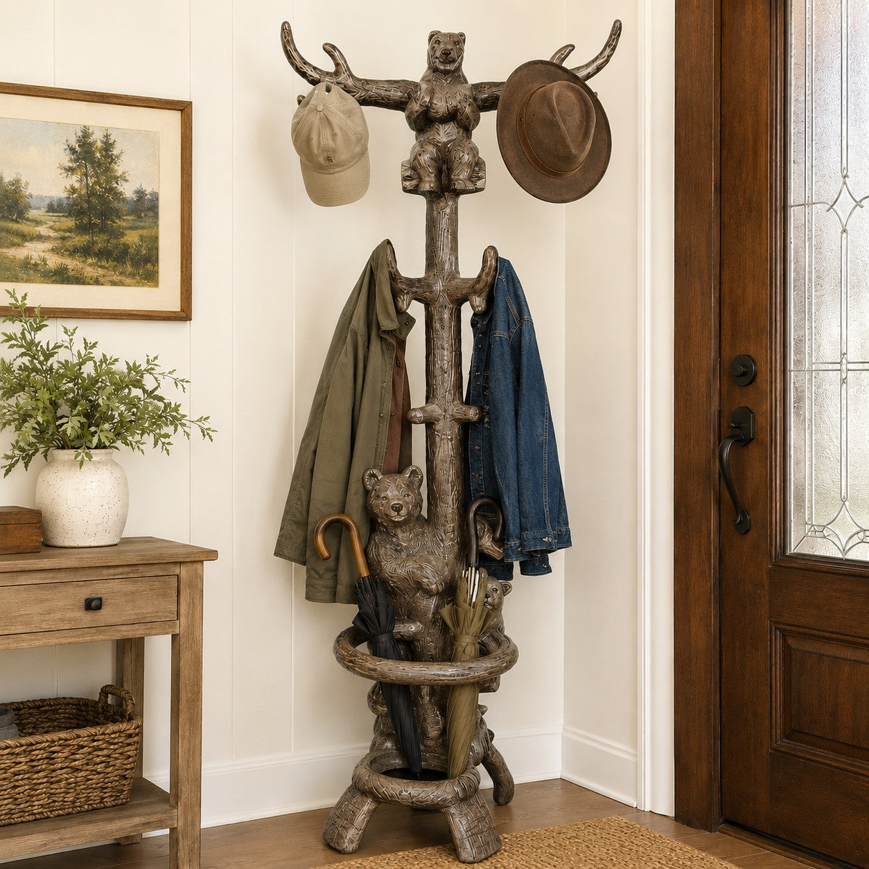 Cast aluminum hall tree for hats, coats, and umbrellas