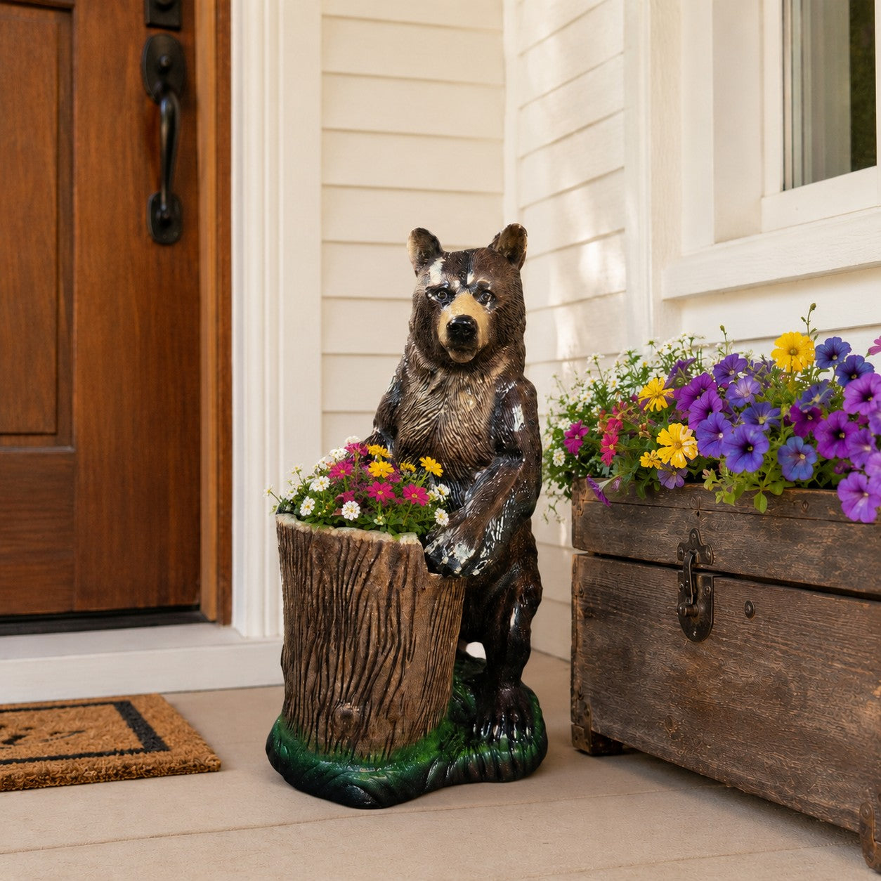 Cast aluminum bear planter with tree stump as pot holder.