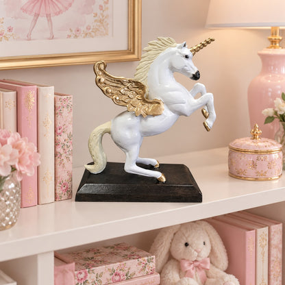 White winged unicorn statue with gold horn and hooves, cast aluminum home decor on dark base