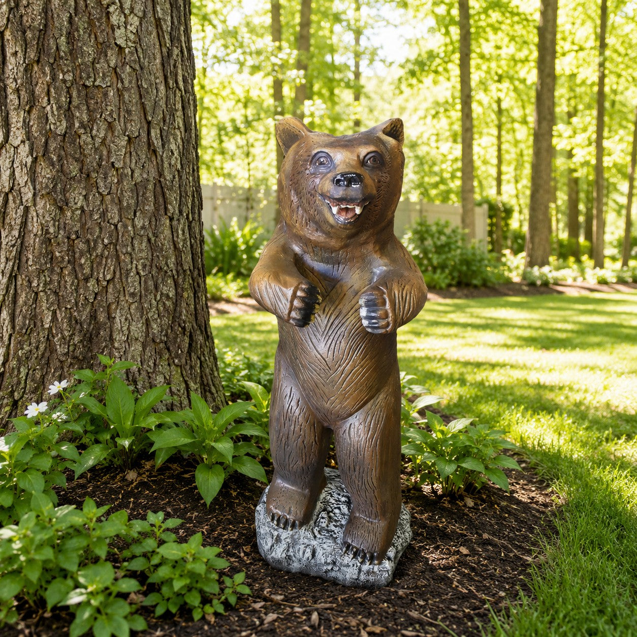 Cast aluminum bear statue for yard decor, standing upright with detailed fur texture and rocky base