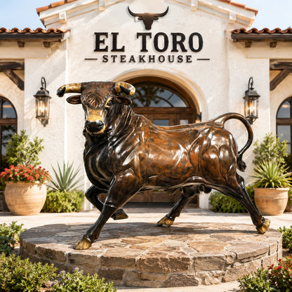 Cast aluminum bull statue for yard or home decor, featuring detailed musculature and bronze finish
