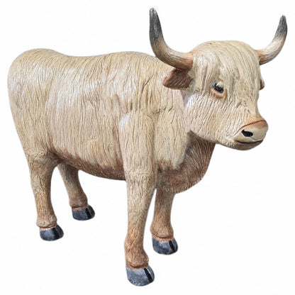 Cast aluminum blonde highland cow with horns showing hair and realistic features