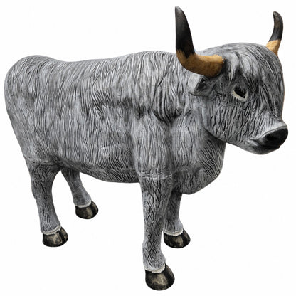 Cast aluminum grey highland cow with horns showing hair and realistic features